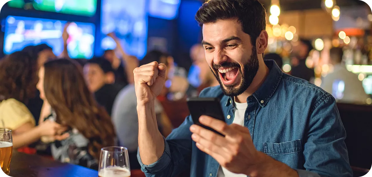 Mobil özgürlük: Wildsino web sitesinin mobil versiyonunu gösteren bir akıllı telefon veya tablet